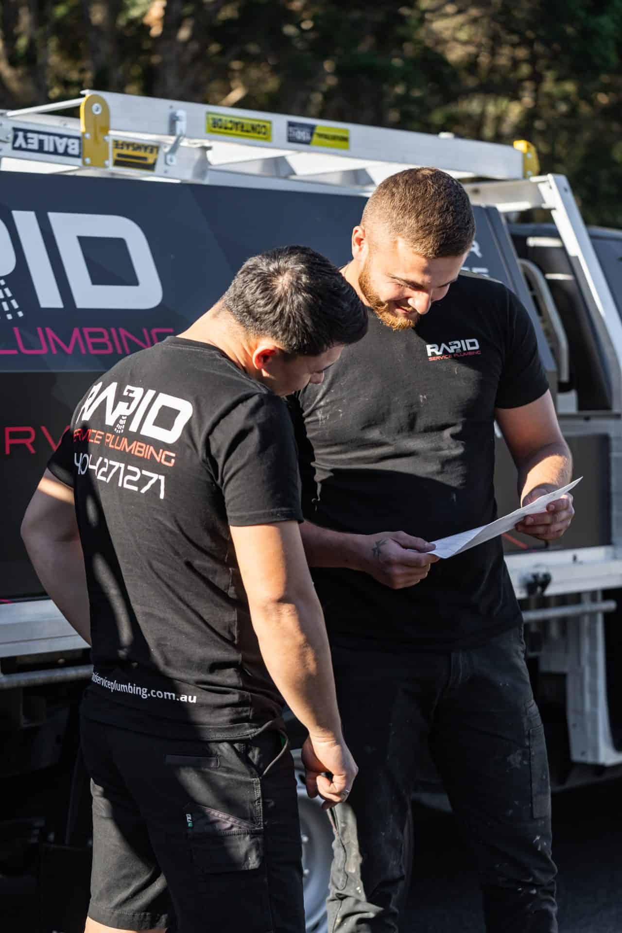 Licensed Sydney plumbers from Rapid Service Plumbing providing professional gas fitting and leak detection services on-site.